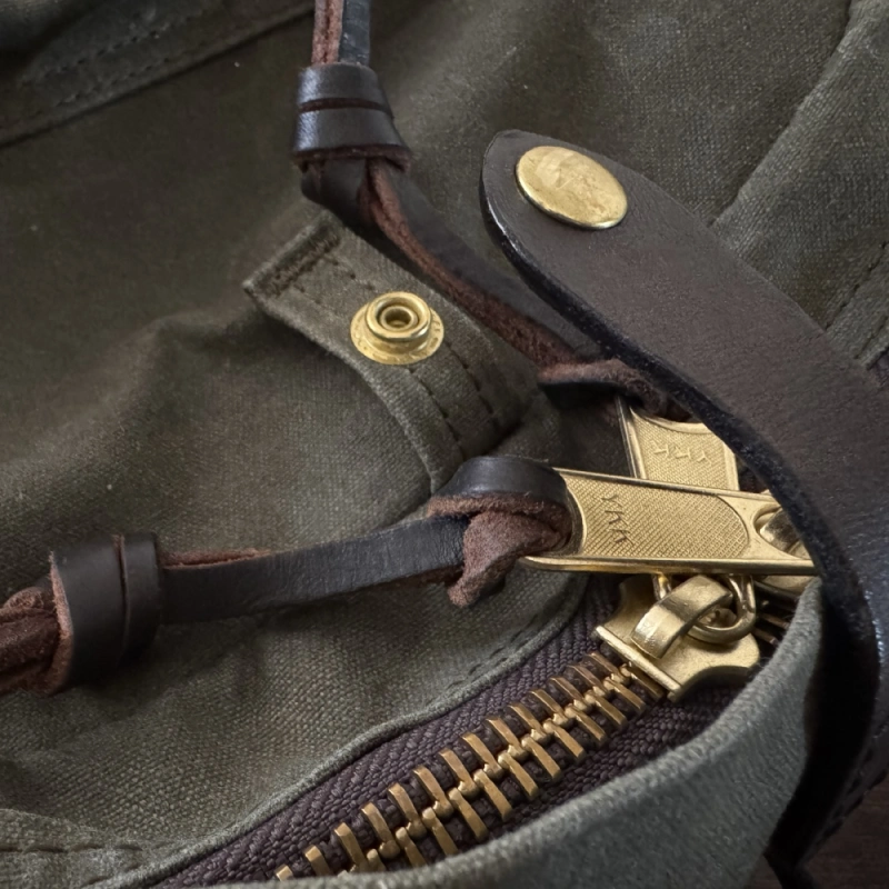 A shot of the fake copy of the Filson Journeyman in Otter Green